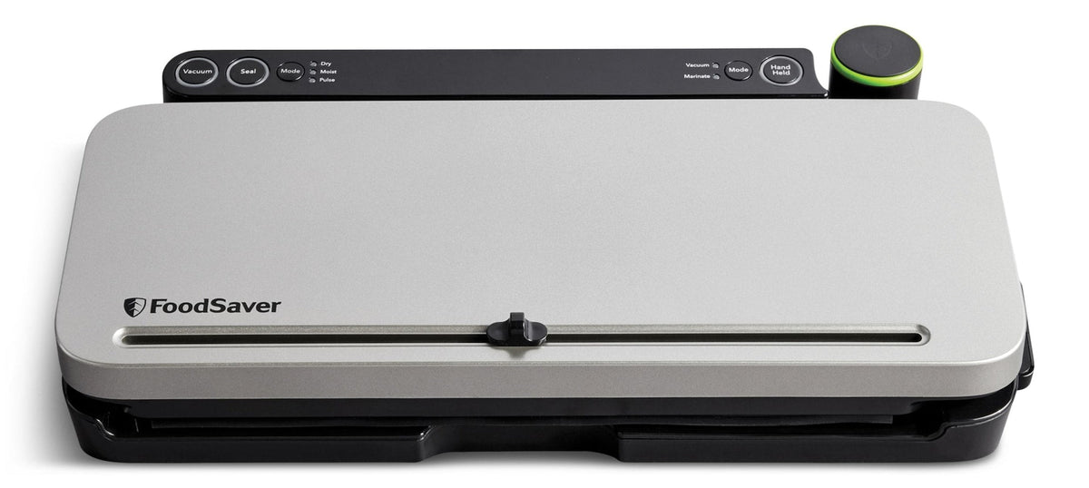 Foodsaver Vacuum Sealer + 4 Heat-Seal Rolls/Bags